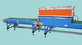 Slider bed PVC belt conveyor system.